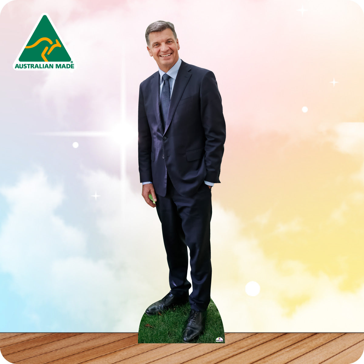 Cardboard cutout of a man in a suit with 'Australian Made' logo on a colorful background