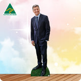 Cardboard cutout of a man in a suit with 'Australian Made' logo on a colorful background