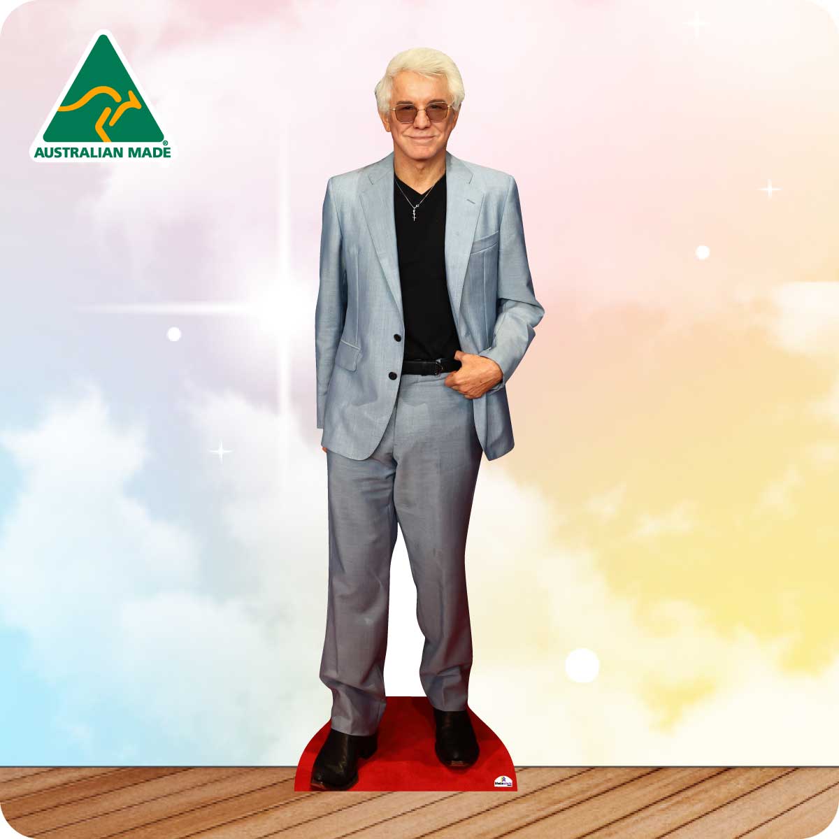 Cardboard cutout of a man in a suit with 'Australian Made' logo on a gradient background