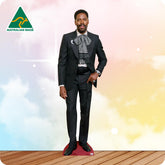 Cardboard cutout of a man in a grey suit with 'Australian Made' logo on a colorful background