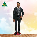 Cardboard cutout of a man in a grey suit with 'Australian Made' logo on a colorful background