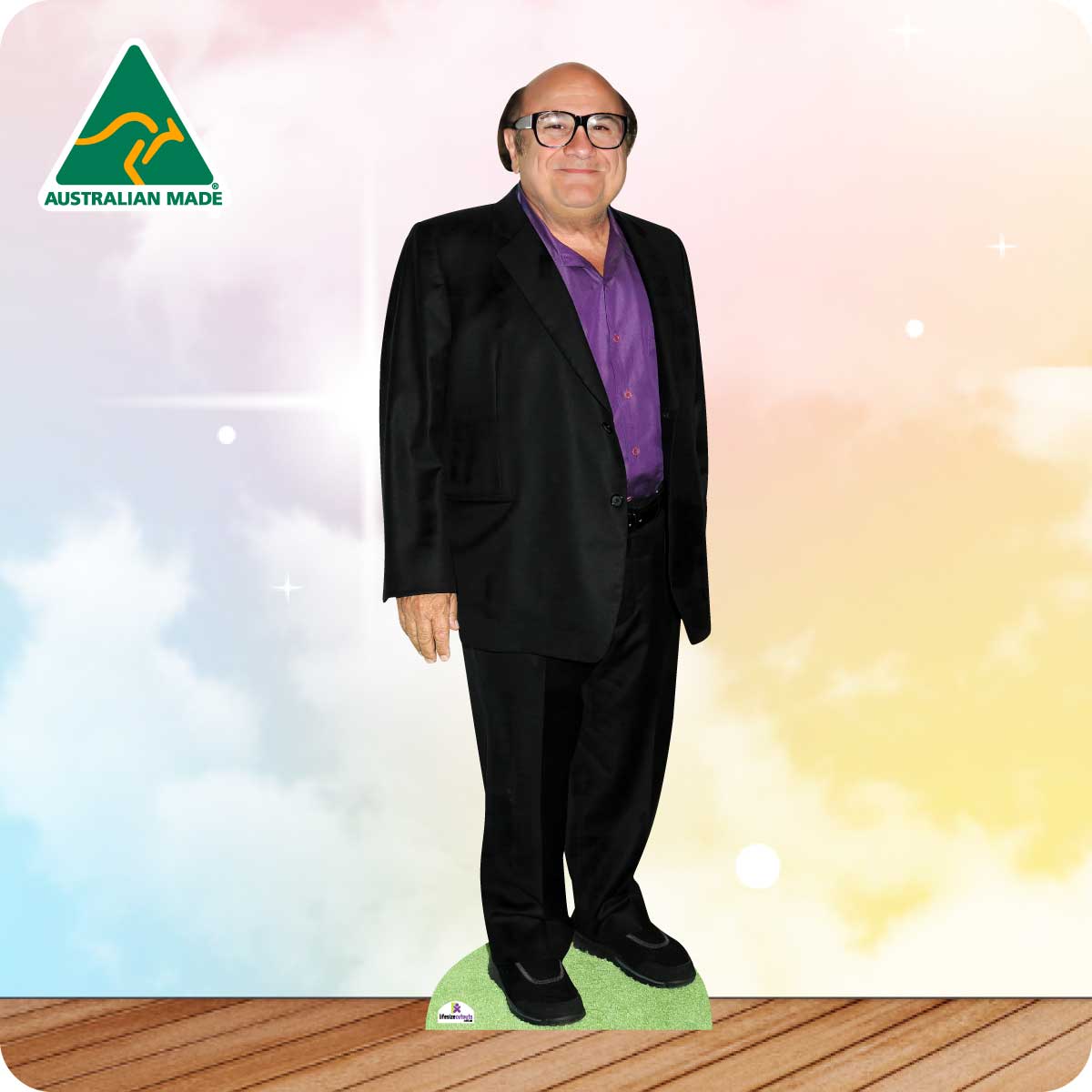 Cardboard cutout of a man in a suit with 'Australian Made' logo on a colorful background