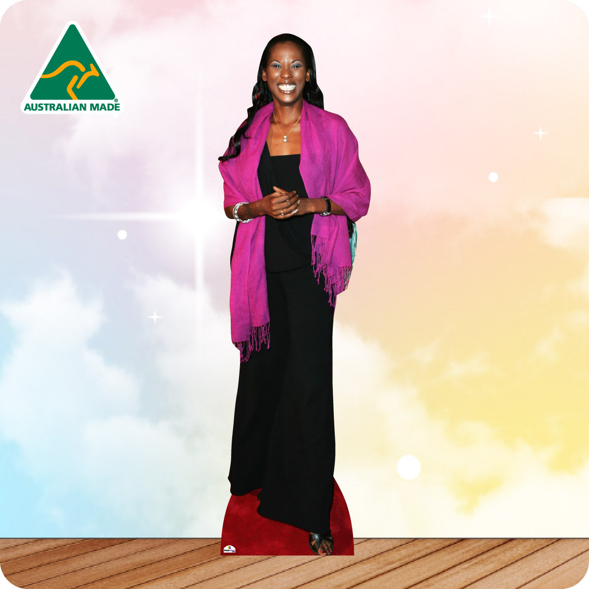 Cardboard standee of a woman in a black dress with a pink scarf with 'Australian Made' logo on a colorful background.