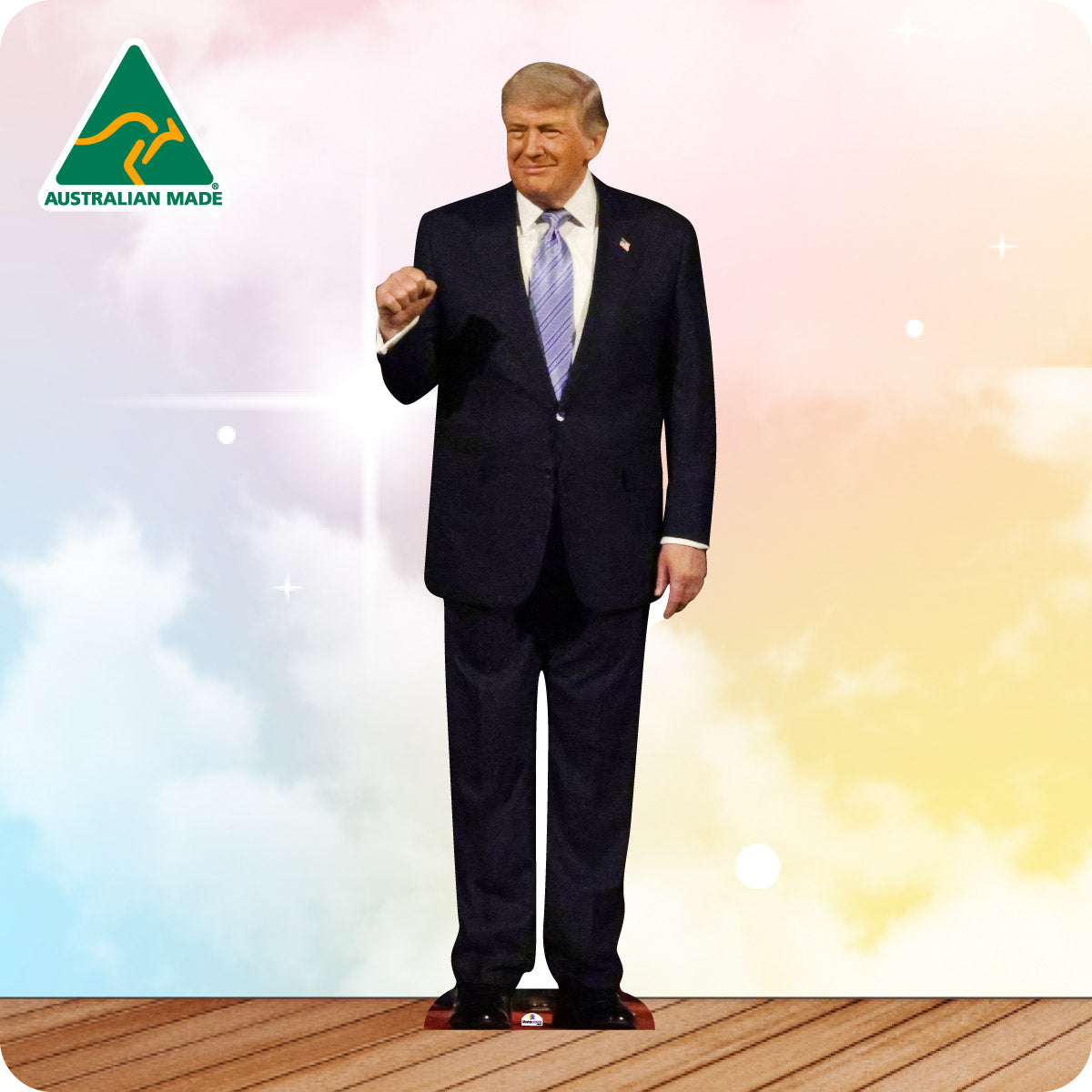 Man in a suit standing on a wooden platform with a colorful background and Australian Made logo.