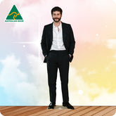 Man in a black suit standing on a wooden deck with a colorful background and Australian Made logo.