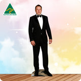 Mannequin in a black suit with bow tie on a wooden floor against a colorful gradient background, featuring 'Australian Made' logo.