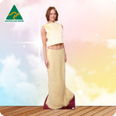 Woman wearing a cream-colored outfit with a blurred background and 'Australian Made' logo.