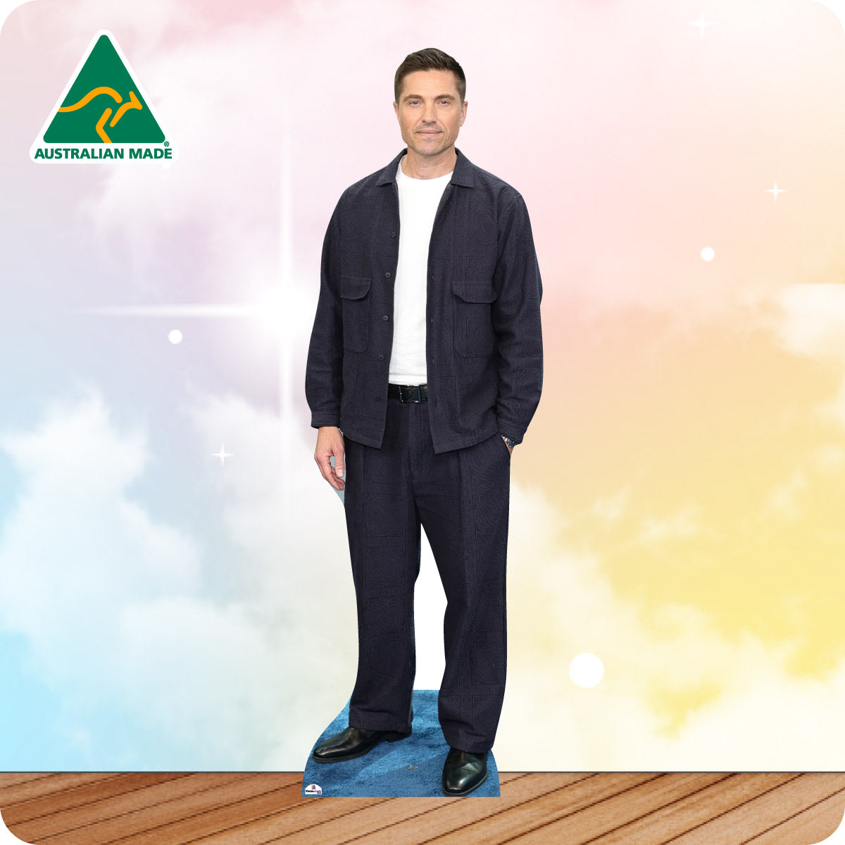 Cardboard cutout of a man wearing a navy blue outfit with 'Australian Made' logo in the corner.