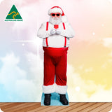Person wearing a Santa Claus costume with suspenders and sunglasses, holding a phone, on a gradient background with 'Australian Made' logo.