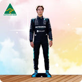 Person wearing a Formula 1 racing suit with visible branding on a gradient background