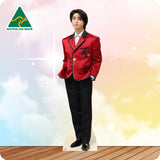 Person wearing a red blazer with a blurred background and 'Australian Made' logo.