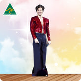 Cardboard cutout of a person wearing a red sequin jacket and black pants on a colorful background with 'Australian Made' logo.