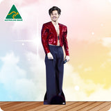 Cardboard cutout of a person wearing a red sequin jacket and black pants on a colorful background with 'Australian Made' logo.
