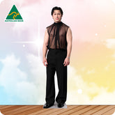 Hudson Williams In a black transparent shirt and black pants.