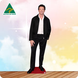 Cardboard standee of a person in formal attire with 'Australian Made' logo on a colorful background