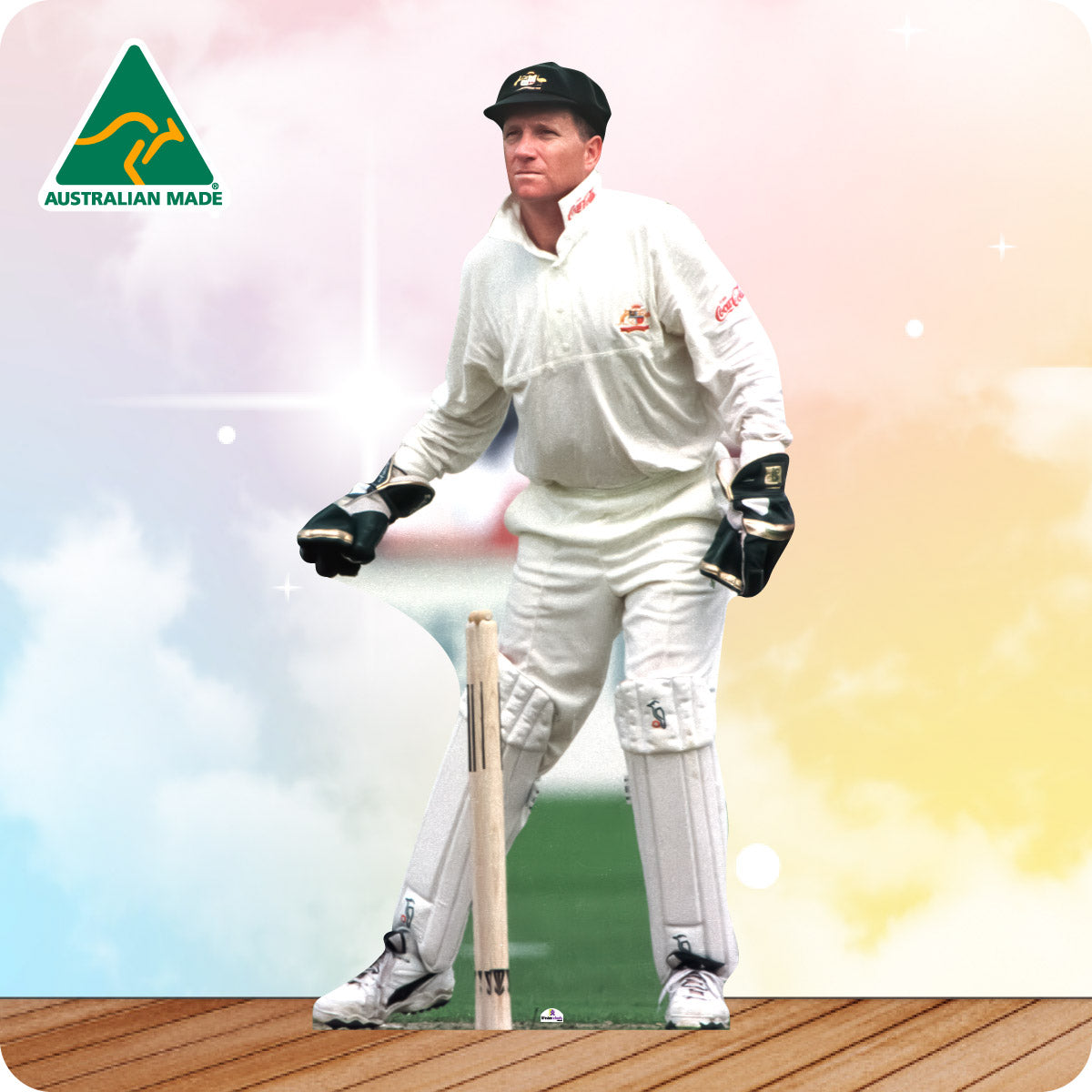 Man wearing a cricket uniform on a colorful background with 'Australian Made' logo.