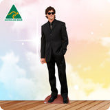 Man wearing a black suit and sunglasses on a colorful background with 'Australian Made' logo.
