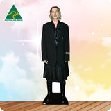Cardboard cutout of a person wearing a black suit with 'Australian Made' logo in the corner.