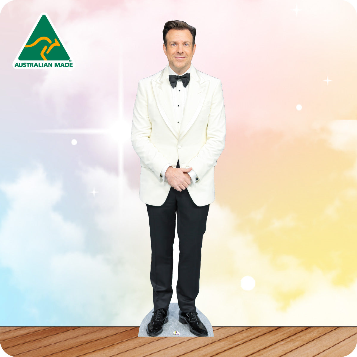 Cardboard cutout of a person in formal attire with 'Australian Made' logo on a gradient background