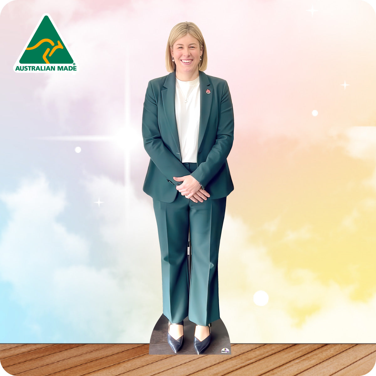 Cardboard cutout of a person in a green suit with 'Australian Made' logo in the corner.