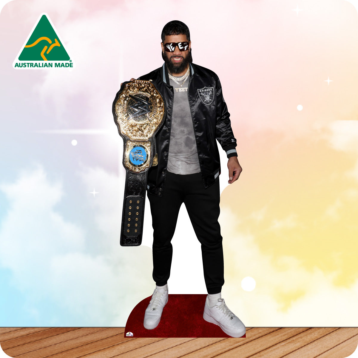 Cardboard cutout of a person holding a championship belt with 'Australian Made' logo in the corner.