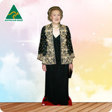 Cardboard cutout of a woman in formal attire with 'Australian Made' logo on a colorful background
