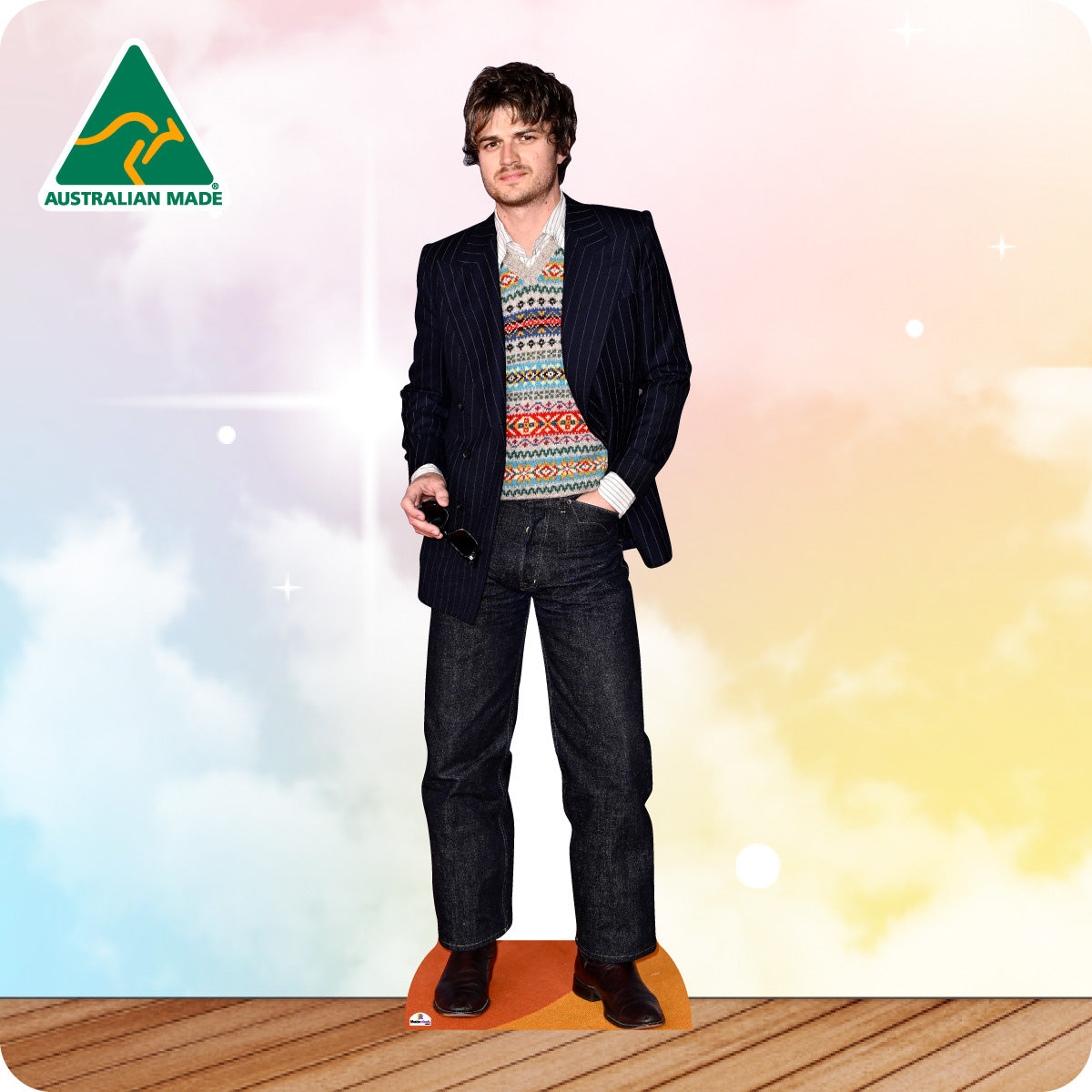 Cardboard cutout of a person wearing a suit and patterned sweater with 'Australian Made' logo.