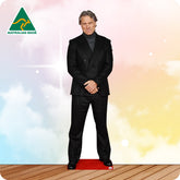 Cardboard cutout of a man in a suit with 'Australian Made' logo on a colorful background