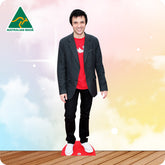 Cardboard cutout of a person wearing a suit and red shirt with 'Australian Made' logo in the corner.
