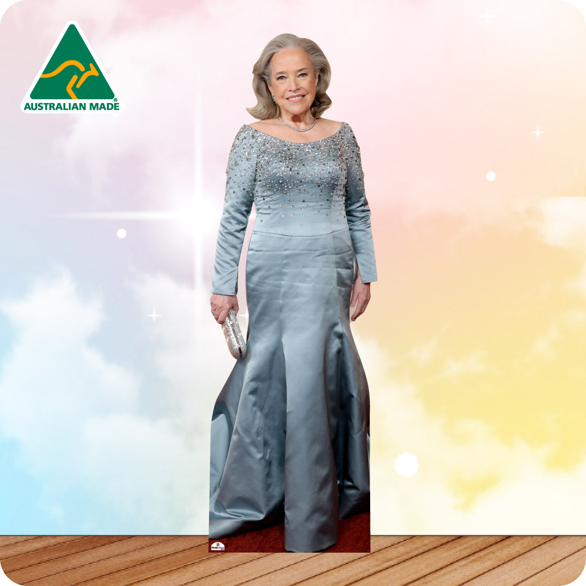 Woman in a formal gown with 'Australian Made' logo in the corner