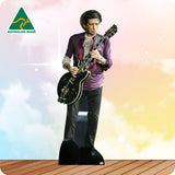 Cardboard cutout of a person playing a guitar with 'Australian Made' logo in the corner.