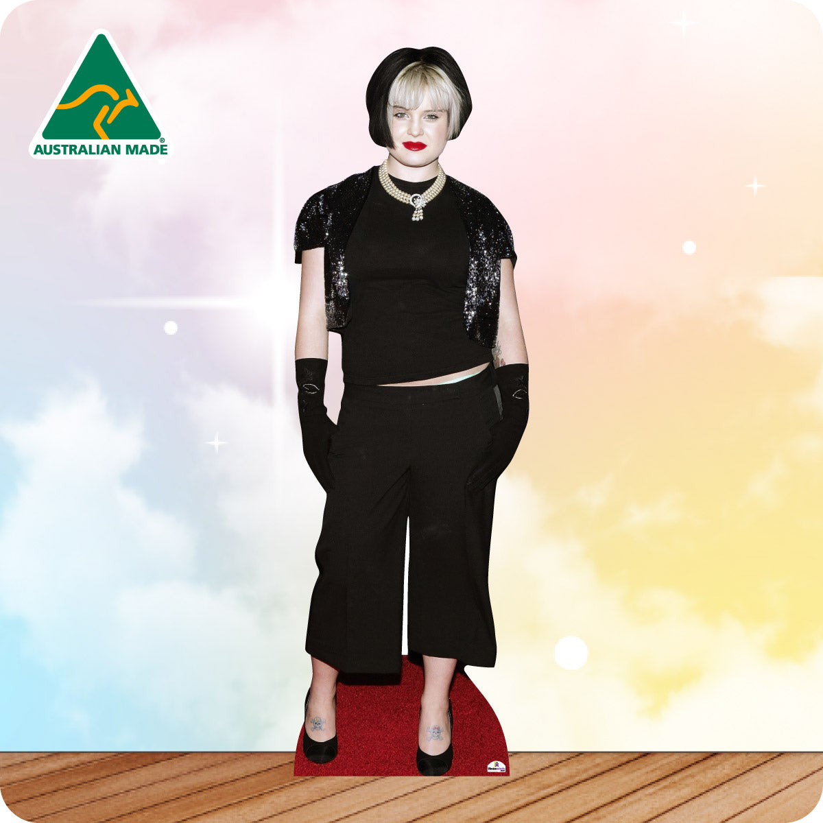 Cardboard cutout of a person in black outfit with 'Australian Made' logo on a colorful background