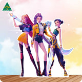 Cardboard cutout of 3 characters in colorful outfit with 'Australian Made' logo on a gradient background