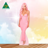 Kylie Jenner with pink hair and wearing a pink dress.