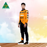 Person wearing an orange and black racing suit with a colorful background and 'Australian Made' logo.