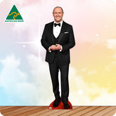 Cardboard standee of a man in a black suit with a bow tie on a colorful background, featuring the 'Australian Made' logo.