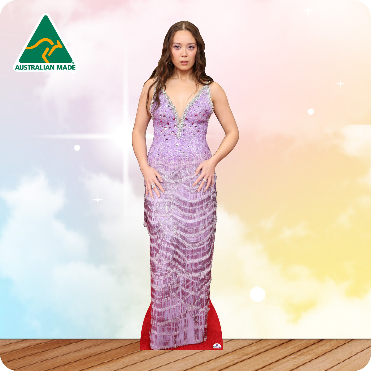 Laufey in a purple evening gown with a blurred background and 'Australian Made' logo.