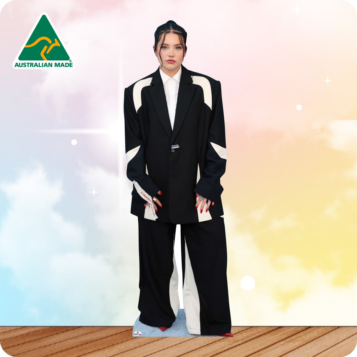 Person wearing a black and white suit with 'Australian Made' logo in the corner