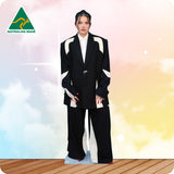 Person wearing a black and white suit with 'Australian Made' logo in the corner