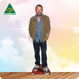 Cardboard cutout of a man standing on a wooden floor with 'Australian Made' logo in the corner.