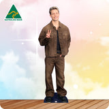 A man wearing a brown denim jacket and matching brown jeans stands on a wooden deck against a pastel sky background with clouds and a blue-and-yellow gradient. The Australian Made logo appears in the top-left corner.