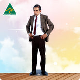 Mr Bean - Rowan Atkinson In Brown jacket with his hands on his hips