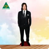 Cardboard cutout of a man in a suit with 'Australian Made' logo on a colorful background