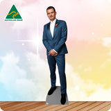 Cardboard cutout of a man in a blue suit with a red poppy against a colorful gradient background, featuring the 'Australian Made' logo.