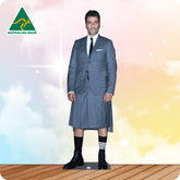 Cardboard cutout of a man wearing a suit standing in front of a colourful background with the Australian Made logo