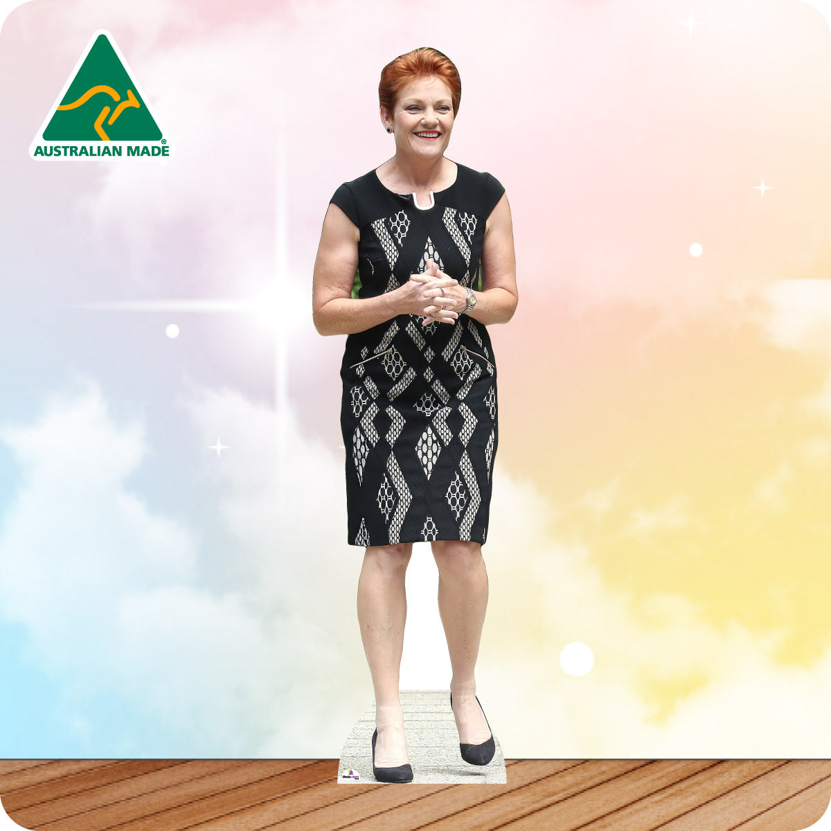 Cardboard cutout of a woman in a black dress with 'Australian Made' logo in the corner.