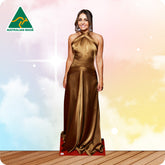 Cardboard standee of a woman in a gold dress with 'Australian Made' logo on a colorful background