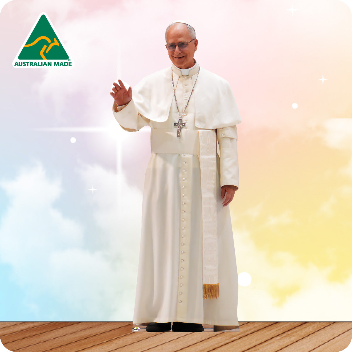 Person in a white robe with a cross pendant on a colorful background with 'Australian Made' logo.
