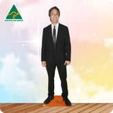 Cardboard standee of a man in a black suit with 'Australian Made' logo on a colorful background.