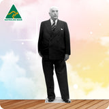 Cardboard standee of a man in a black suit with 'Australian Made' logo on a colorful background.